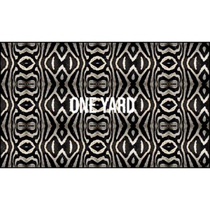 May include: A rectangular fabric with a black and white zebra stripe pattern. The text "ONE YARD" is centered in white. The design features a symmetrical arrangement of the zebra print.