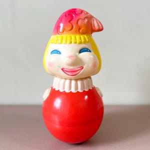 Vintage Celluloid Roly Poly Doll: USSR Musical Petrushka Toy