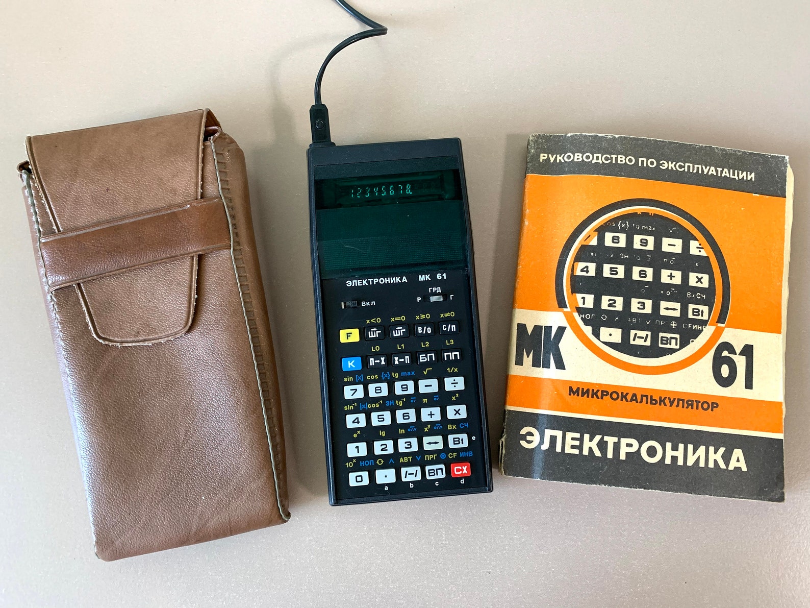Электроника мк 61. МК-61 калькулятор. Программируемый калькулятор СССР. МК 61. Лучший программируемый калькулятор СССР.