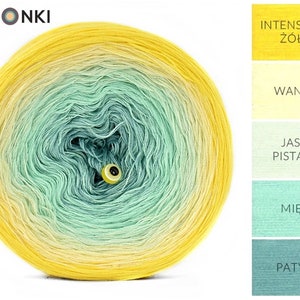 May include: A ball of yarn with a gradient of yellow, light yellow, light green, and dark green. The yarn is wound into a ball and the center of the ball is visible. The yarn is labeled "KOKONKI" and the colors are labeled "INTENSYWNY Ż&Oacute;ŁTY", "WANILIA", "JASNA PISTACJĄ", "MIĘTA", and "PATYNA".