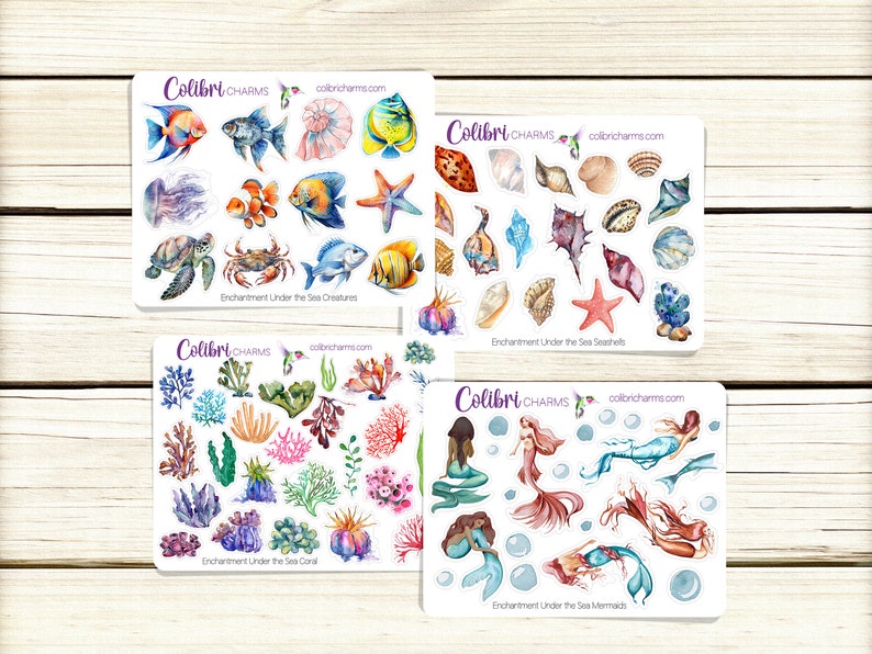 May include: Four sheets of stickers featuring watercolor illustrations of sea creatures, seashells, coral, and mermaids. Each sheet has the text "Colibri CHARMS" and "colibricharms.com".