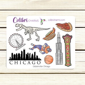 May include: A set of eight stickers featuring various Chicago-themed illustrations, including a dinosaur skeleton, a hot dog, a pizza slice, a Ferris wheel, a basketball, a Chicago skyline, a skyscraper, and a "Chicago" sign. The stickers are white with black outlines and colorful accents. The text "Colibri CHARMS" and "globetrotter Chicago" are also included.