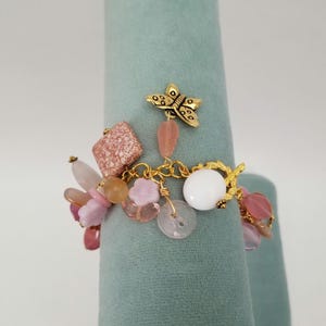 Pink Beads With Butterflies Charm Bracelet