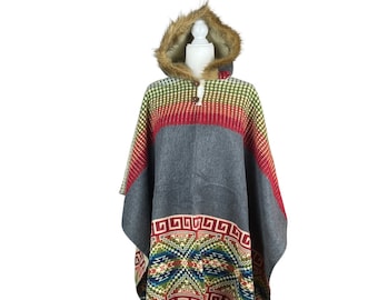 May include: Gray hooded poncho with a colorful geometric pattern and a faux fur trim around the hood.