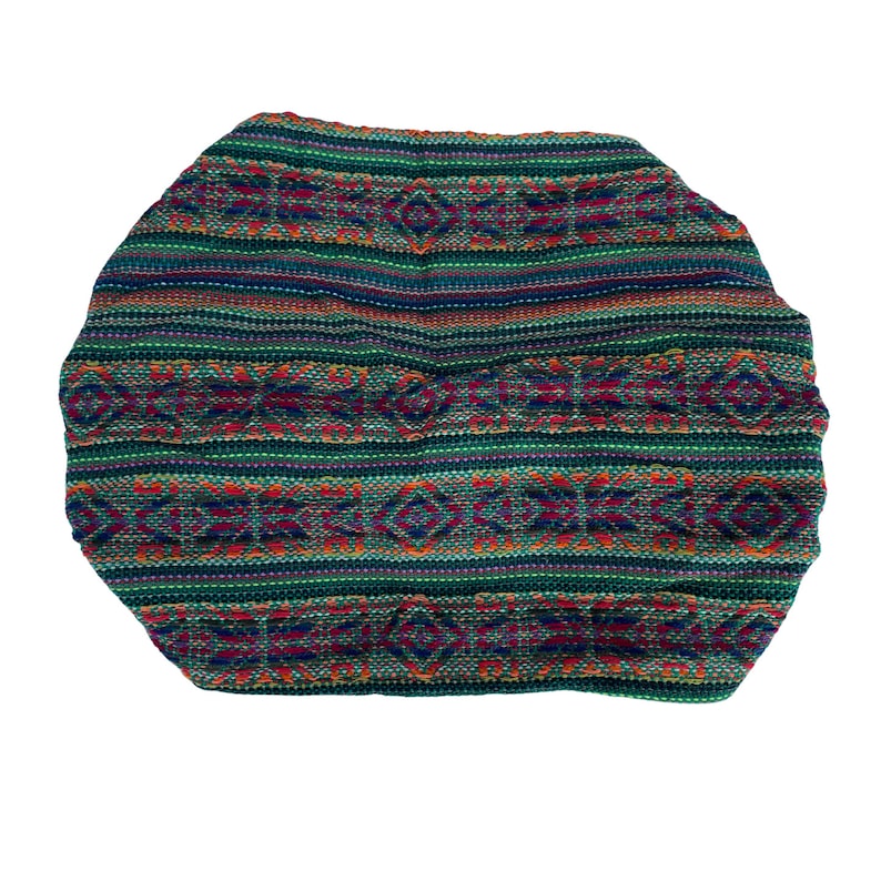 Puede incluir: Una diadema de tela con estampado geom&eacute;trico verde, rojo y azul.