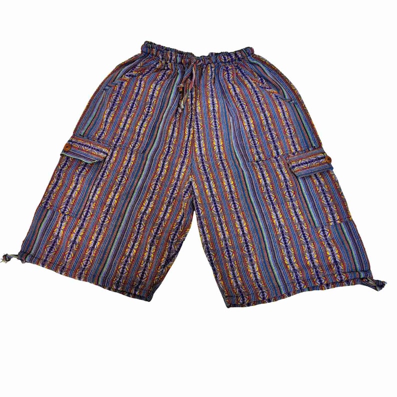 May include: Knee-length cargo shorts featuring a vibrant, multi-colored vertical striped pattern in shades of blue, orange, and purple. These shorts include an elastic waistband with a drawstring, two side cargo pockets with flaps, and adjustable drawstrings at the leg openings.