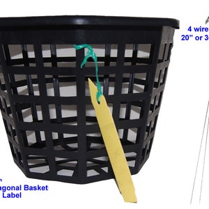May include: A black, 4-inch octagonal basket with a label attached. The basket has a grid-like design. A silver wire hanger, available in 20 or 30-inch lengths, is also included. The label is yellow and attached with green string.