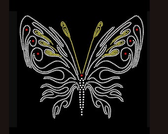 May include: A butterfly design created with small, circular studs on a black background. The butterfly features white, yellow, and red studs arranged in intricate, swirling patterns that form the wings, body, and antennae of the insect.