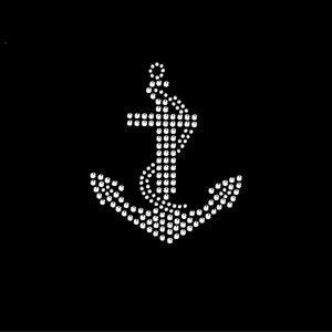 May include: A white anchor made of rhinestones on a black background.