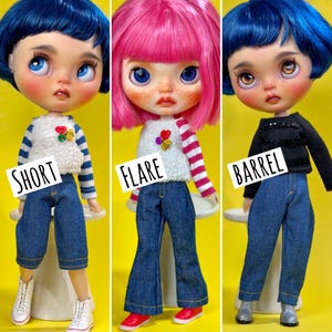 May include: Three dolls with distinct hairstyles and outfits against a yellow background. The first doll has blue hair, a white fuzzy top, blue striped sleeves, and cropped jeans. The second has pink hair, a white fuzzy top, pink striped sleeves, and flared jeans. The third has blue hair, a black top, and straight-leg jeans. Text labels read SHORT, FLARE, and BARREL.