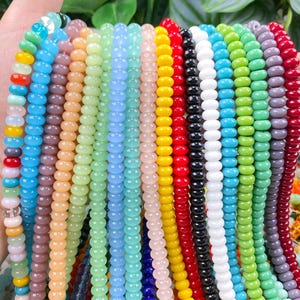 50 tipos de colores de cuentas planas de vidrio de 5 x 8 mm en forma de rondel/HeiShi, cuentas sueltas para la fabricación de joyas/collares/pulseras/bricolaje, para estuches de regalo.