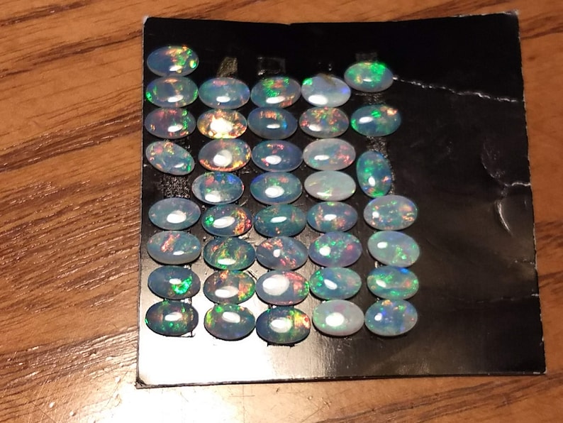 Opals 6 X 4 Cabochons natural stone nice colors Wholesale lot of 39 pieces = approx 6.76cts