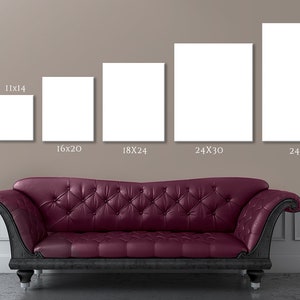 May include: Five different sizes of blank white canvas prints displayed on a wall above a burgundy tufted sofa. The canvas sizes are 8x10 inches, 11x14 inches, 16x20 inches, 18x24 inches, 24x30 inches, and 24x36 inches.