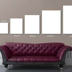 May include: Five different sizes of blank white canvas prints displayed on a wall above a burgundy tufted sofa. The canvas sizes are 8x10 inches, 11x14 inches, 16x20 inches, 18x24 inches, 24x30 inches, and 24x36 inches.