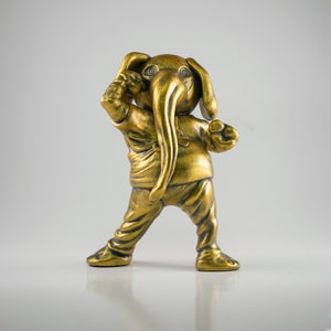 Collectible golden figure of University of Alabama Crimson Tide mascot Big Al.