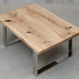Live edge coffee table made of oak wood, small coffee table with polished steel legs, industrial coffee table, rustical coffee table.