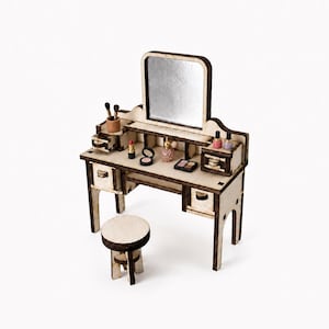 May include: A miniature wooden vanity table with a mirror and a matching stool. The set features dark burnt edges and includes tiny accessories such as a lipstick, a perfume bottle, makeup brushes, and small containers arranged on the tabletop.
