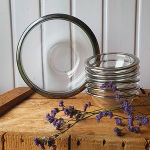 Fine, old salad dishes with silver-plated rim, glass bowls set