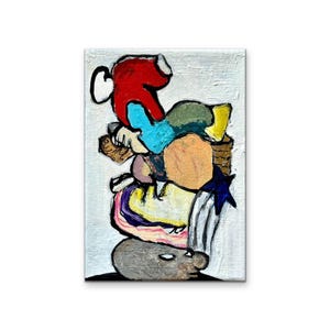 Pode incluir: Pintura abstrata sobre tela com uma pilha de formas coloridas. A obra de arte inclui uma forma vermelha, elementos azuis, amarelos e laranja, e uma estrela azul escura. A pintura está em um fundo branco.