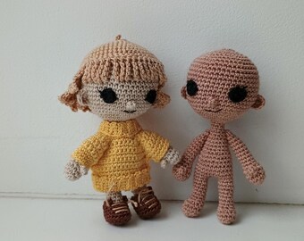 Crochet pattern for tiny doll in removable clothes and hairstyle