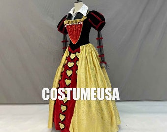 May include: A red and gold Queen of Hearts costume with a black velvet bodice, a white collar, and a red heart pattern on the skirt. The costume is on a mannequin and the text "CostumeUSA" is visible in the image.