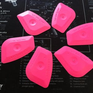 Six Lil’ Chizler scraper removal and installation tools