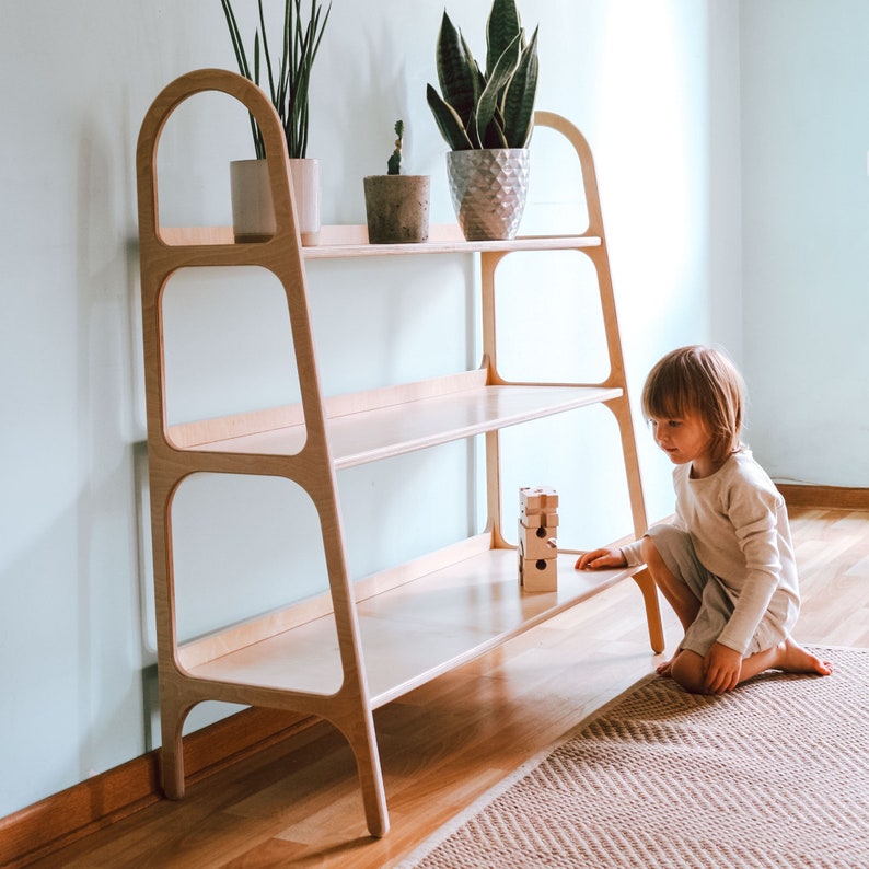 montessori shelf with 3 different dept