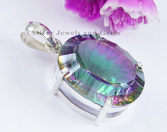 May include: A silver pendant featuring a large oval-shaped iridescent gemstone with a rainbow of colors, including green, blue, purple, and pink. The gemstone is set in a silver bezel with a simple design.