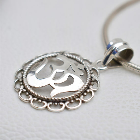 Silver om deals pendant online