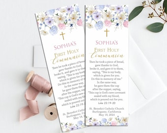 Pode incluir: Dois marcadores de página com designs florais e letras douradas. Os marcadores apresentam uma citação bíblica sobre a primeira comunhão. O texto diz: «Tomou pão, deu graças, partiu-o e deu-lho, dizendo: «Este é o meu corpo, que é dado por vós. Fazei isto em memória de mim.» Do mesmo modo, depois da ceia, tomou o cálice e disse: «Este cálice é a nova aliança no meu sangue, que é derramado por vós.» Lucas 22, 19-20.  Primeira Comunhão de Sophia. Igreja Católica São Bento, Burlingame, Califórnia. 18 de maio de 2024.