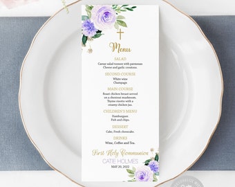 May include: A printable menu template for a First Holy Communion celebration. The menu features a floral design with purple and white flowers and gold accents. The text on the menu includes the words "First Holy Communion", "Cate Holmes", and "May 20, 2022".