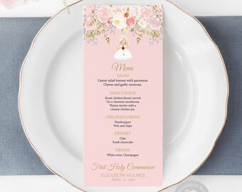 May include: A pink and white floral menu card with a gold border. The menu card features a cartoon illustration of a girl in a white dress and a gold crown. The text on the menu card reads "Menu", "Salad", "Caesar salad tosser with parmesan Cheese and garlic croutons", "Main Course", "Roast chicken breast served On a chestnut mushroom Thyme risotto with a creamy chicken jus", "Children's Menu", "Hamburger", "Fish and chips", "Dessert", "Cake", "Fresh cheesecake", "Drinks", "White wine, Champagne", "First Holy Communion", "Elizabeth Holmes", "April 27, 2021".