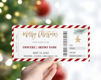 Può includere: Un biglietto di Natale a strisce rosse e bianche con la scritta dorata "Merry Christmas". Il biglietto dice "You're going to see CONCERT/ARTIST NAME" e ha la data "MAY 15, 2023" e l'ora "9:00PM". Il biglietto dice anche "THEATRE/SAN DIEGO, CA."