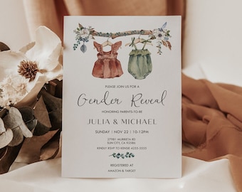 May include: A gender reveal party invitation with a watercolor illustration of two baby outfits hanging on a branch with flowers. The text reads "Please join us for a Gender Reveal Honoring Parents-to-be Julia & Michael Sunday Nov 22 | 10-12PM 27981 Murrieta Rd Sun City, CA 92586 Kindly RSVP to Kensie 4255-5555 Registered at Amazon & Target"