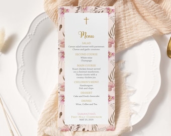 May include: A pink and gold menu card with floral designs and a cross at the top. The menu includes a salad, second course, main course, children's menu, dessert, and drinks. The card also includes the text "Samantha's First Holy Communion May 20, 2000".