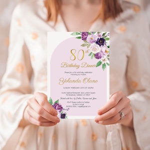 May include: Purple and white floral birthday dinner invitation with gold lettering. The invitation reads "80th Birthday Dinner" and includes the name "Yolanda Olano".
