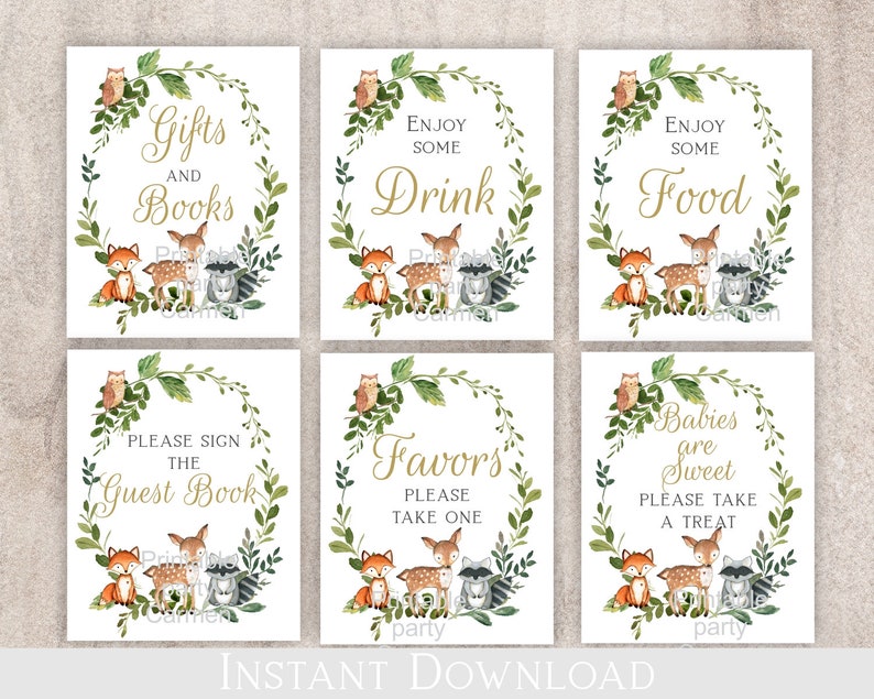 May include: Six printable signs for a baby shower with a woodland theme. The signs feature a wreath of green leaves and branches with a fox, deer, and raccoon. The signs say "Gifts and Books", "Enjoy Some Drink", "Enjoy Some Food", "Please Sign the Guest Book", "Favors Please Take One", and "Babies are Sweet Please Take a Treat".