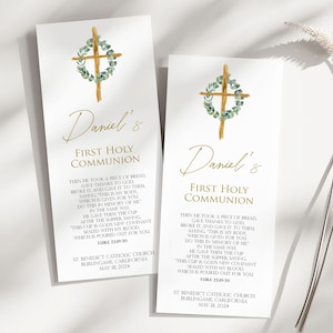 May include: A gold and green first communion invitation with a cross and a wreath of eucalyptus leaves. The text reads "Daniel's First Holy Communion" and includes a bible verse from Luke 22:19-20. The invitation is for a ceremony at St. Benedict Catholic Church in Burlingame, California on May 18, 2024.