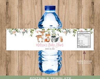 May include: Water bottle label template with a woodland animal theme. The label features a deer, fox, raccoon, and owl with pink flowers and greenery. The text on the label reads "Melissa's Baby Shower March 20, 2021".