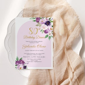 May include: Purple and white floral birthday dinner invitation with gold lettering. The invitation reads "80th Birthday Dinner" and includes the date, time, and location of the event. It also includes the name "Yolanda Olano" and the RSVP information.
