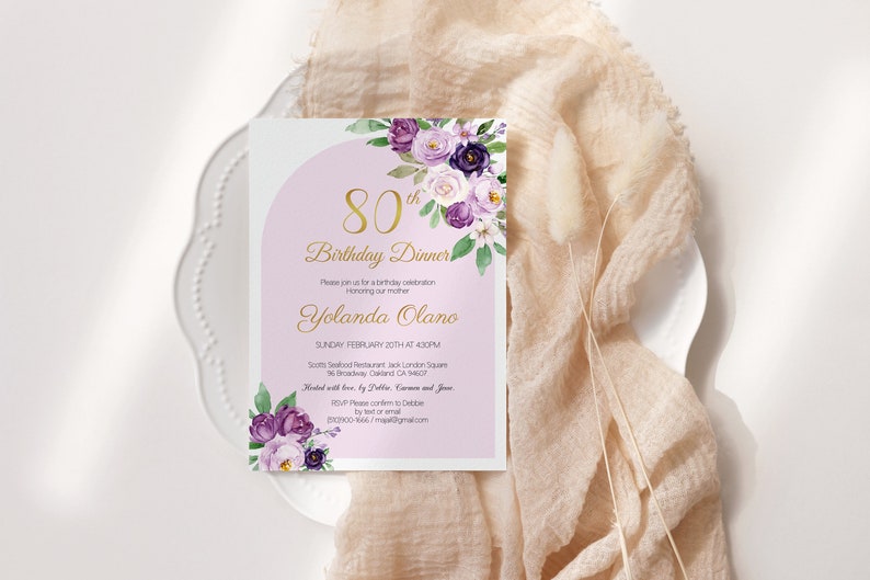 May include: Purple and white floral birthday dinner invitation with gold lettering. The invitation reads "80th Birthday Dinner" and includes the date, time, and location of the event. It also includes the name "Yolanda Olano" and the RSVP information.