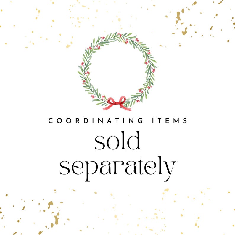 May include: A watercolor illustration of a green wreath with red berries and a red bow. The text "COORDINATING ITEMS sold separately" is below the wreath.