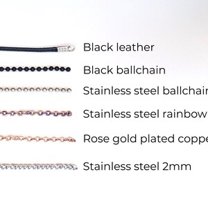 May include: A comparison of different types of chains, including black leather, black ball chain, stainless steel ball chain, stainless steel rainbow chain, rose gold plated copper chain, and stainless steel 2mm chain.