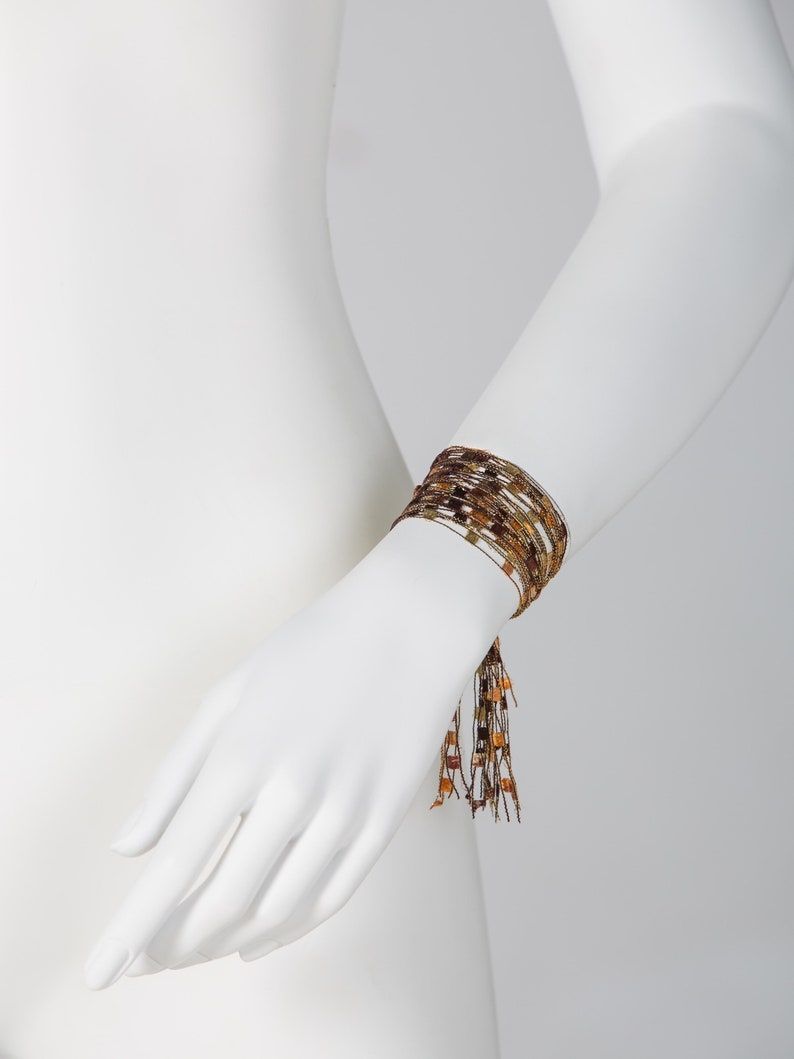 soft Multi-threaded bracelet with magnetic clasp Brown Golden Color lightweight Bright durable and easy to use.