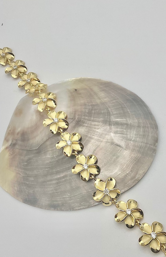 Gold on sale plumeria bracelet