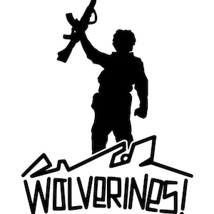 May include: Black silhouette of a person holding a rifle above their head. The person is standing on top of the word "WOLVERINES!" in a stylized font. The image is set against a white background.