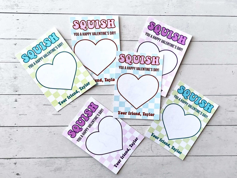 May include: Five colorful Valentine's Day cards with a heart shape and the text "SQUISH YOU A HAPPY VALENTINE'S DAY!" and "Your friend, Taylor".