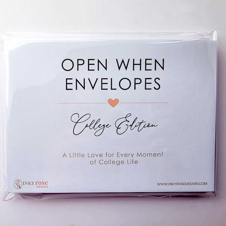 May include: A set of white paper envelopes in a clear plastic sleeve. The front label reads OPEN WHEN ENVELOPES College Edition A Little Love for Every Moment of College Life with a small peach heart and the Inky Rose Design logo and website.