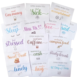 May include: A collection of white envelopes with colorful text and icons. Each envelope is labeled with phrases like Open When You Need Gas Money, Feel Sick, Want to Celebrate an Accomplishment, Can't Sleep, Miss Us, Need Some Love, Feel Sad, Stressed, Caffeine, Campus Food, Sweet Treat, Cash, Study Break, Lonely, Hug, or Finish Your 1st Day of Class.