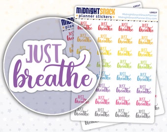 May include: A sheet of planner stickers with the phrase "Just Breathe" repeated in various colors and fonts. The stickers are designed for use in a planner or journal.